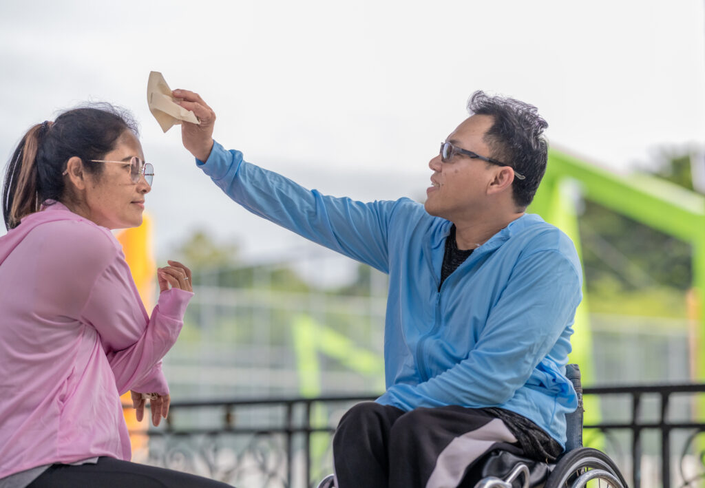 caring moment between couple outdoors caring moment between couple outdoors